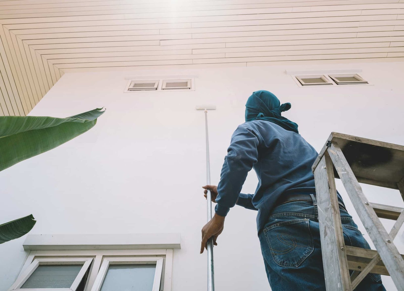 Man painting wall